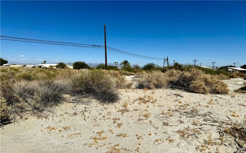 Houses on right side of parcel - there is a manufactured home.