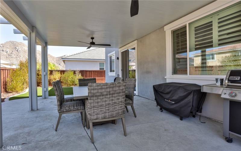 Back patio has room for your bbq. Plenty of room for entertaining. Check out that view in the background!