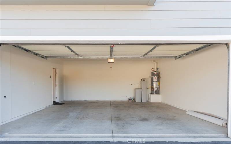 Spacious garage with EV charging plug and water softener