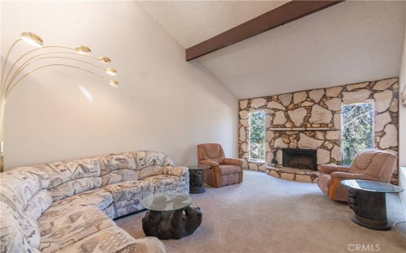 Cozy fireplace accents this great room