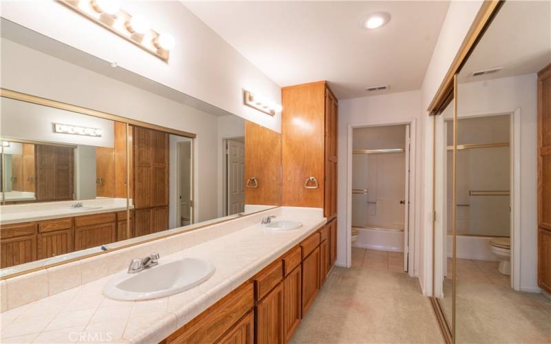 Full primary bath with mirrored closet doors