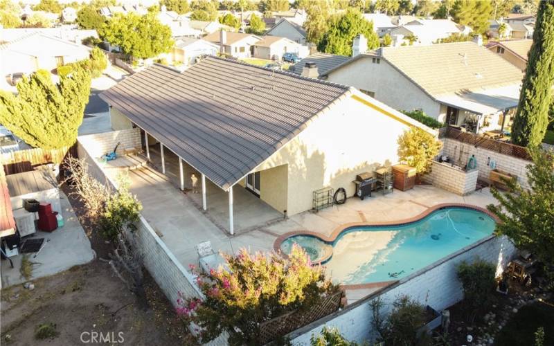 Built in pool and spa completely surrounded by a private block wall.  To the left is the large rear patio.