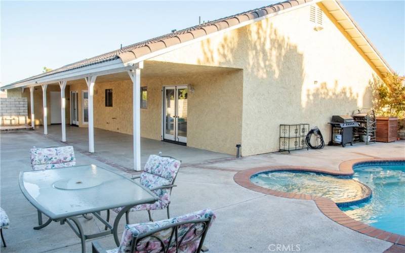 Built in pool and spa completely surrounded by a private block wall.  To the left is the large rear patio.