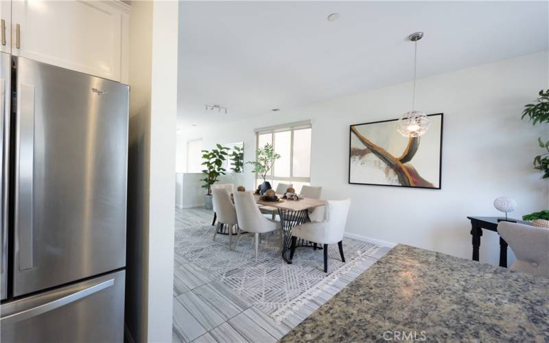 Kitchen with Stainless Steel Appliances, including Fridge