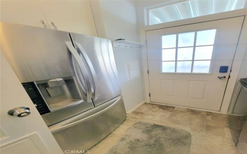 Extra fridge/laundry room