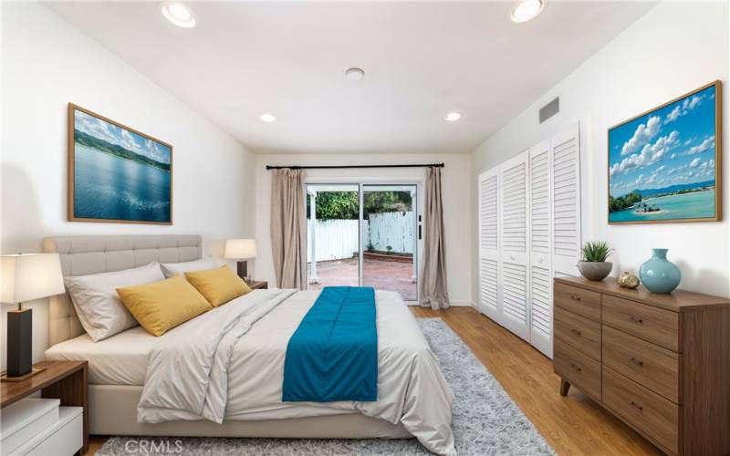 Third bedroom with a private patio.