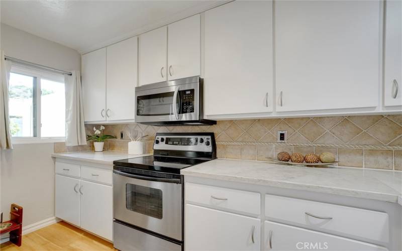 Kitchen features a real natural stone counter top