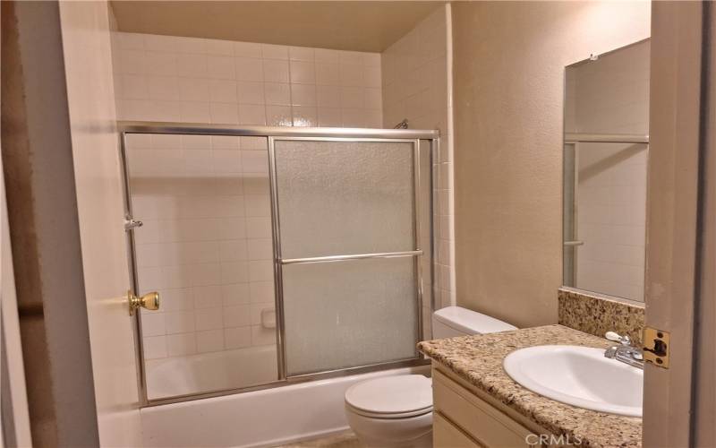 Upstairs bathroom full bath with tub