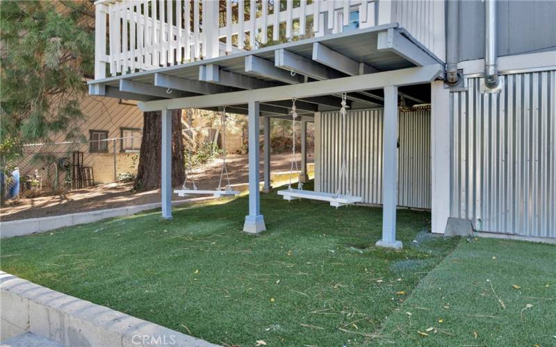 underdeck swings and lounge area