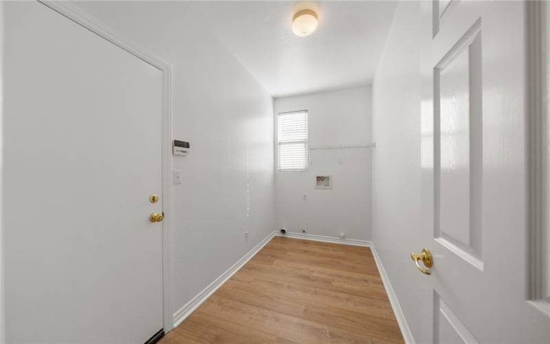 Downstairs indoor laundry area