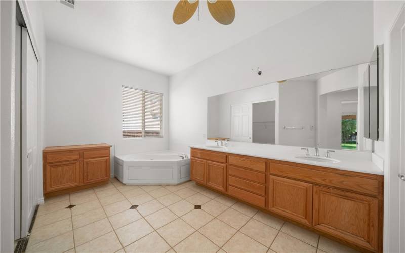 Primary bathroom with separate tub and shower