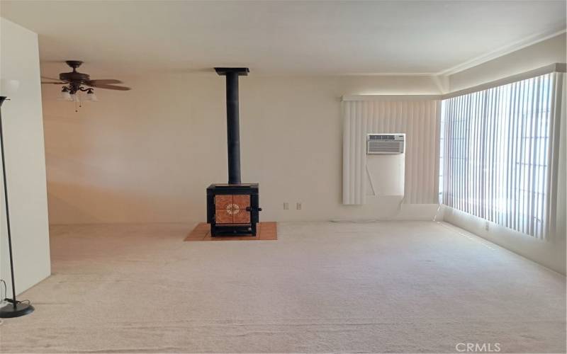 overlooking the living adjacent to dining area on the left side with built-in cabinet