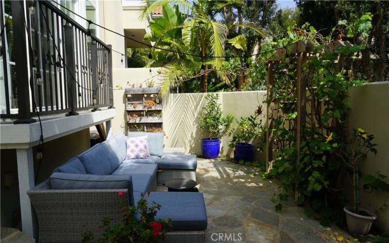 Private front courtyard with stone patio