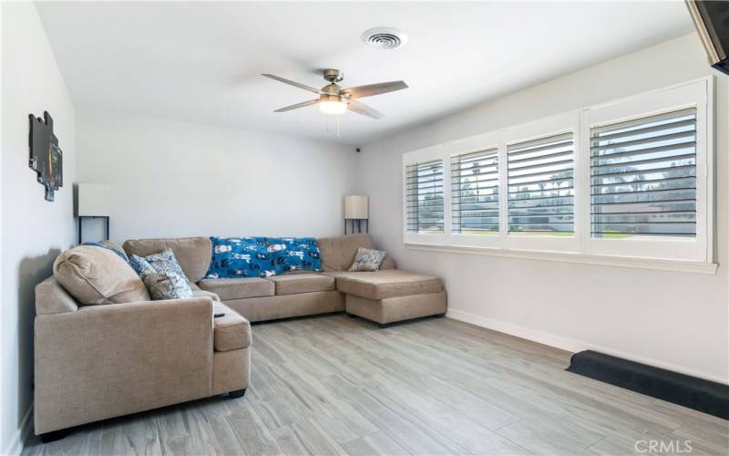 This is a picture of the living room. I took the picture from the front door, looking into the room.  Plenty of natural light it's airy and bright.