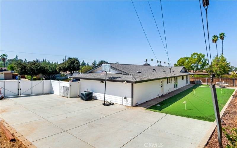 This is a view of the backyard at an angle. There's still plenty of room for outdoor activities.