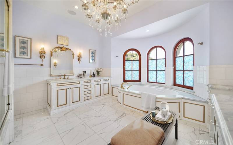 Primary Bathroom with jacuzzi tub, shower and double two separate vanity's.