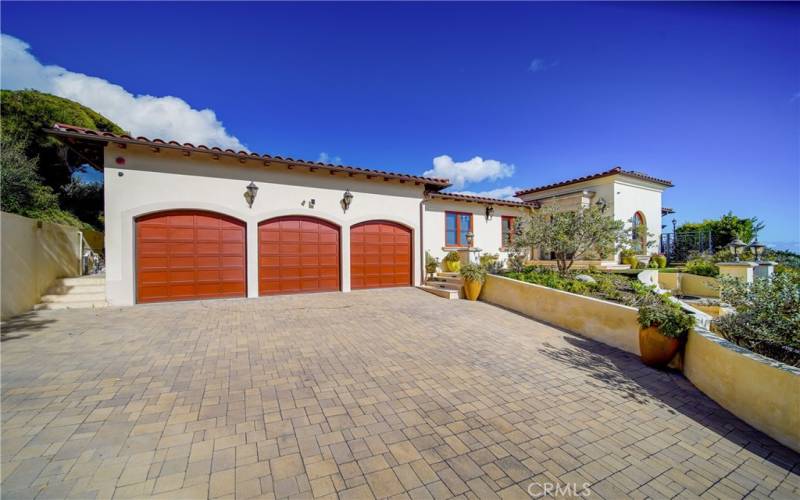 Three car garage with complete built ins and bike racks