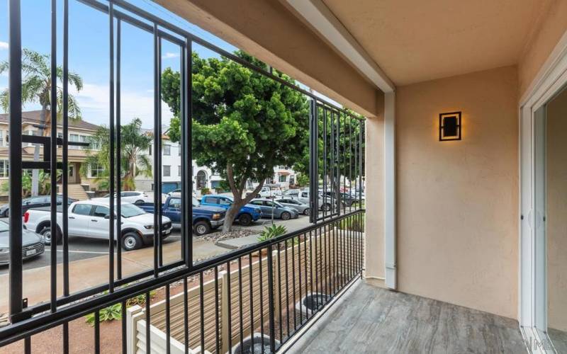 ENJOY THE BREEZE! Security gating provides peace of mind, allowing you to enjoy your outdoor space in the city. Leave the slider open while you step out. Note the 