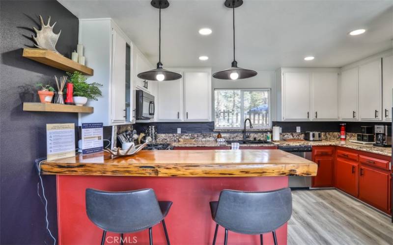 Pendant lights over the natural-wood top