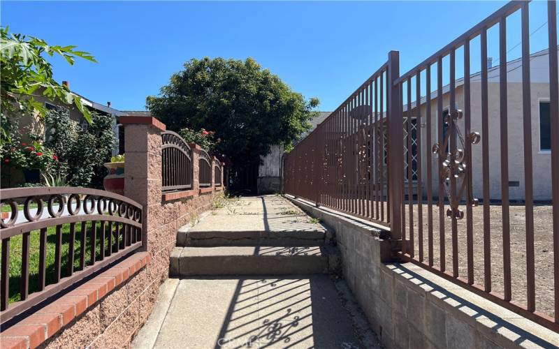 Walkway to front door from Del Amo