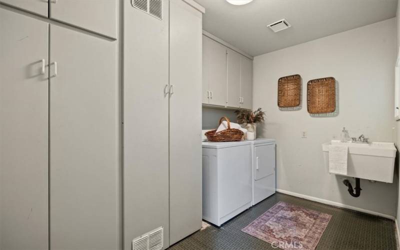 Downstairs Laundry Room w/ Storage & Utility Sink