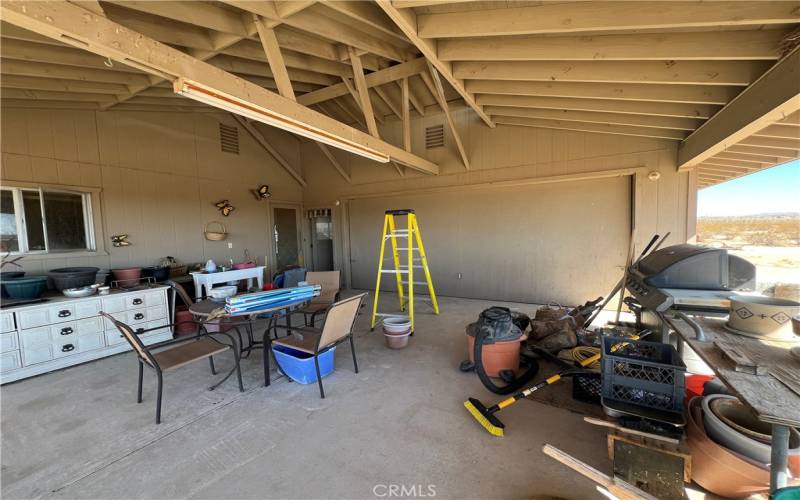 Entrance to the garage from carport