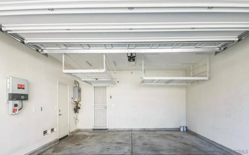 Spacious 2 car Garage with overhead storage racks