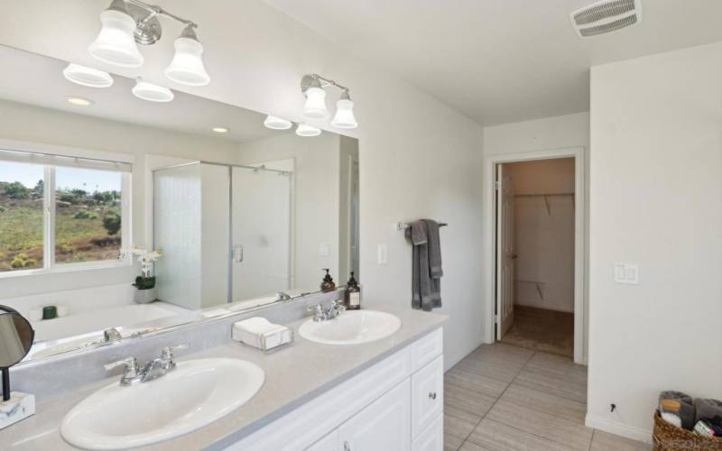 Dual sink vanity with Piedrafina Marble counter top.