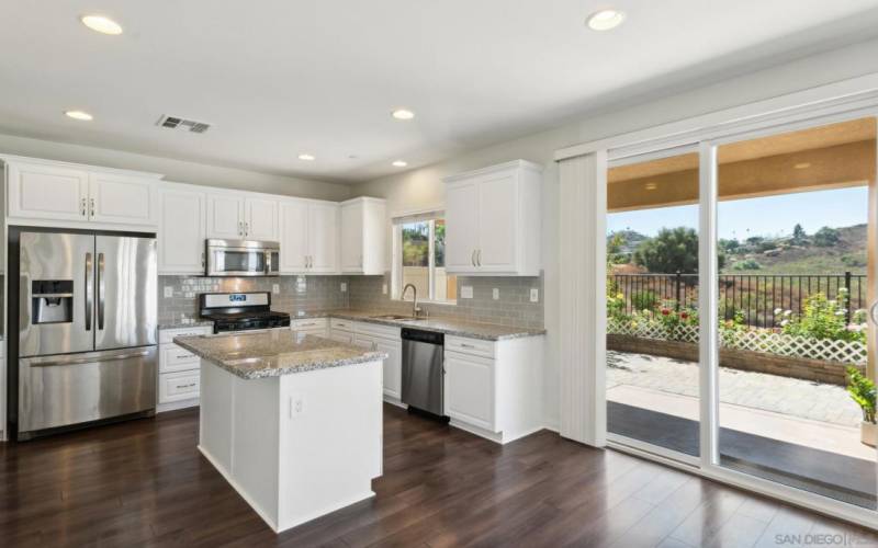 White Shaker cabinets and gleaming stainless appliances!