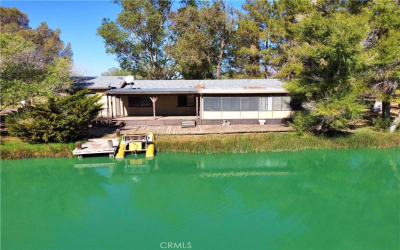 View of house from across the lake