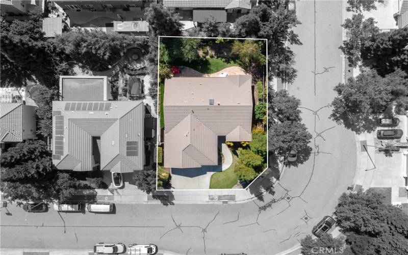 Aerial view of house on corner lot