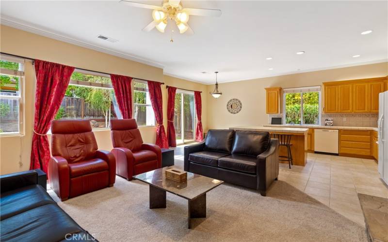 Living room opens to kitchen