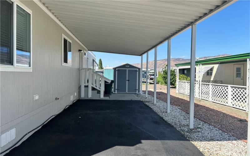 carport with shed