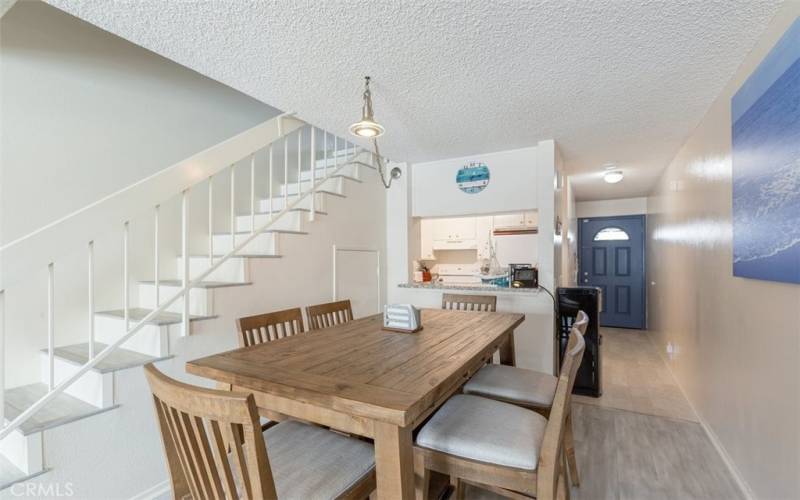 DINING AREA AND STAIRS TO BEDS