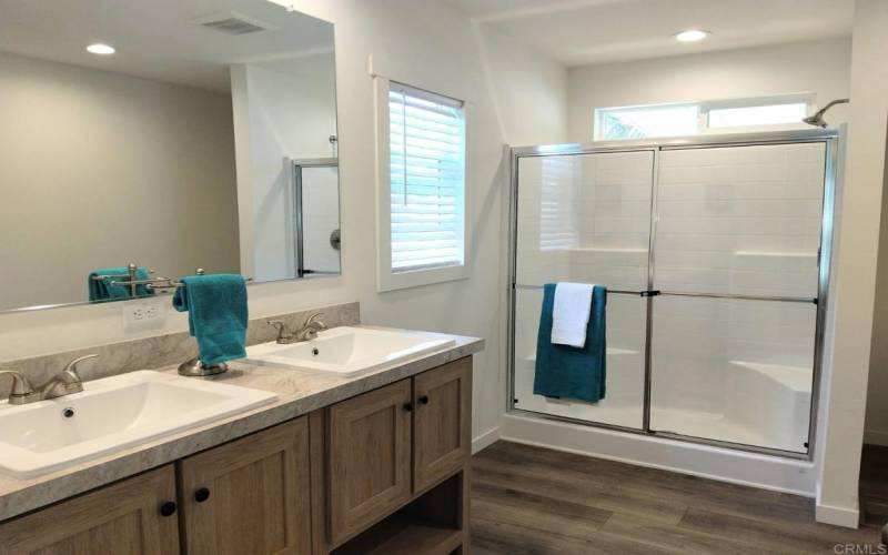 Primary Bath with Walk-in Shower and Dual Sinks!