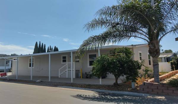 corner lot and huge covered carport!