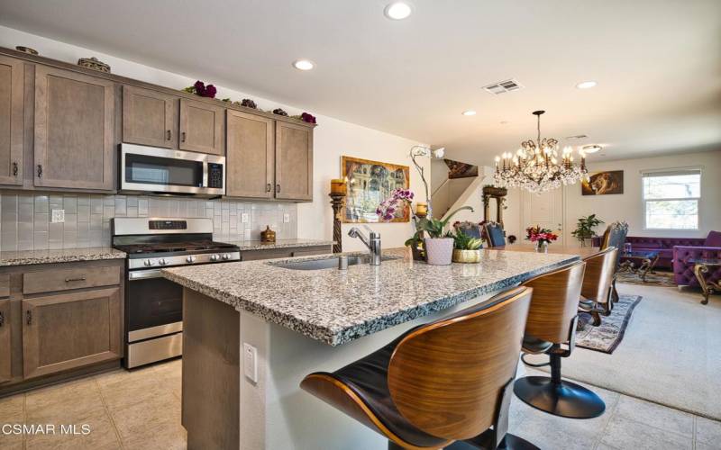 Kitchen with open concept room