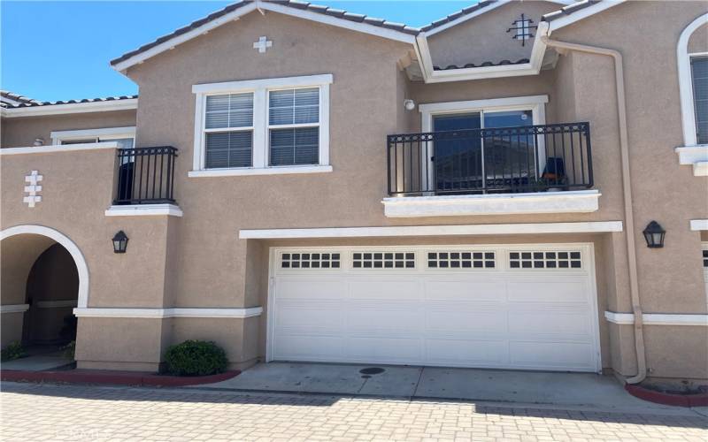 2-car garage and balcony from dining area