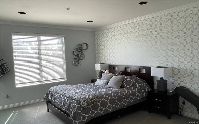 Master bedroom with recessed lights