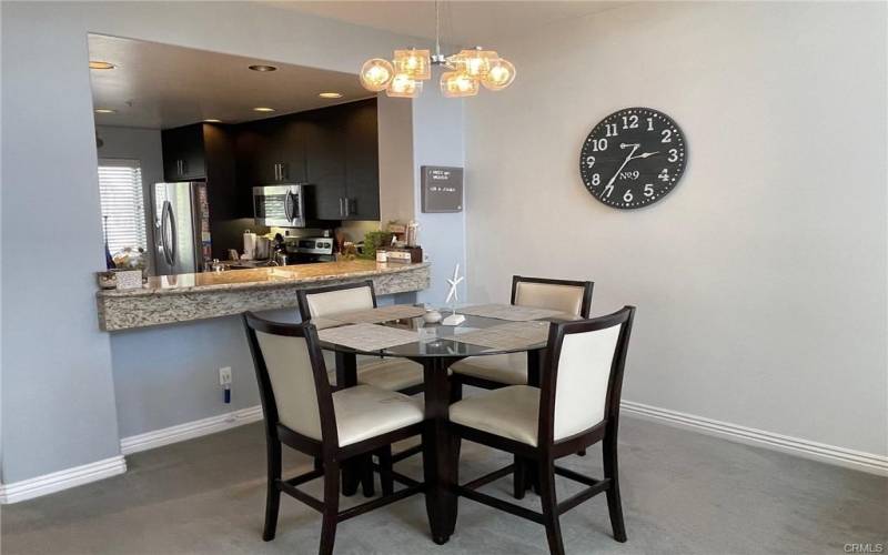 Kitchen open to dining and living room