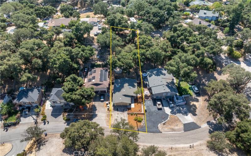 The home sits on ~ 1/4 acre and spans street-to-street.