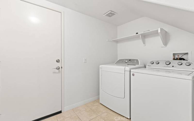 Washer and dryer included, first level laundry room with access to your two car garage.