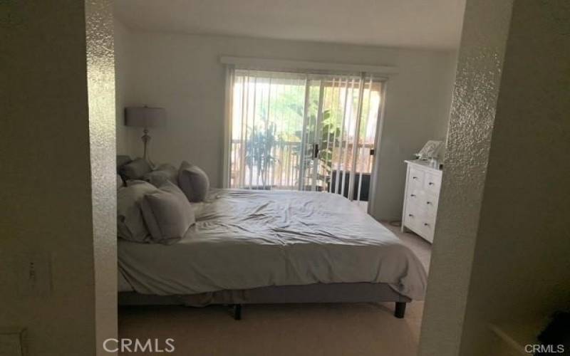 large bedroom with access to balcony