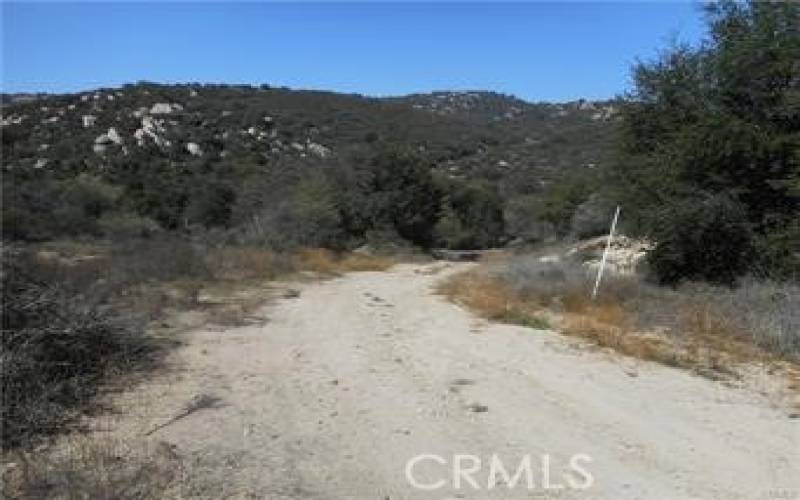 Dirt road up to the property.