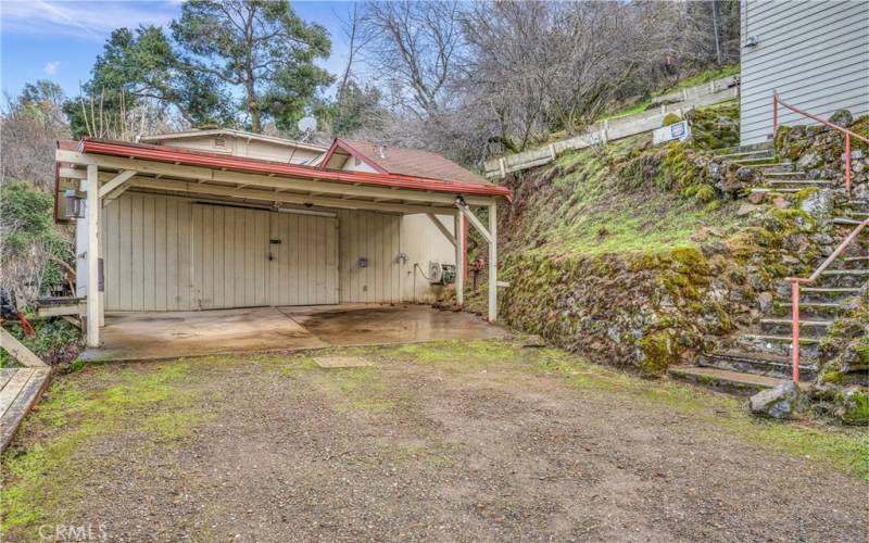 Carport and garage building at driveway