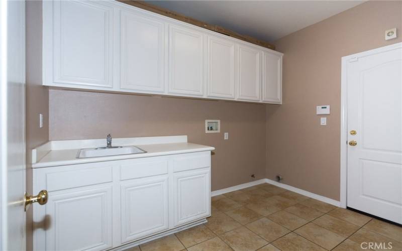 Laundry room with direct access to the garage