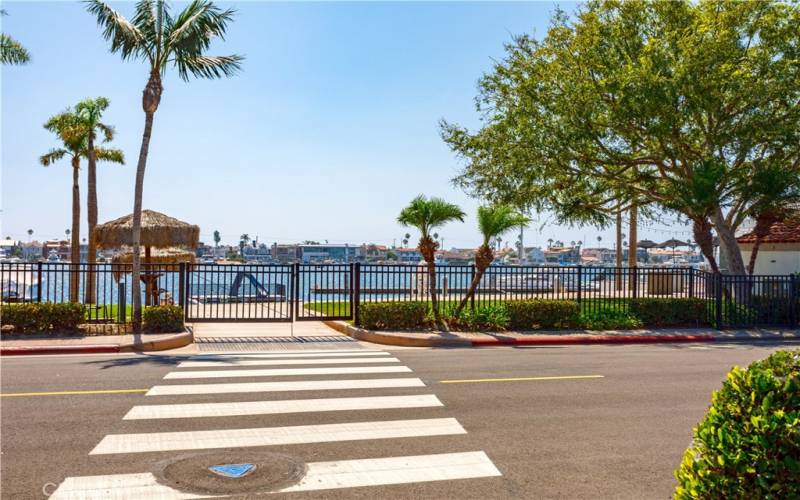 A few feet to from Lido Beach, Clubhouse and Tennis court