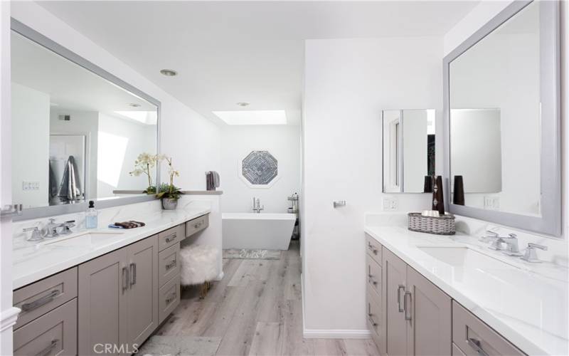 Primary Master Bathroom with 2 vanities and seating area