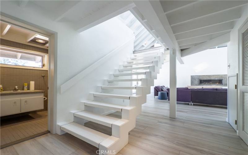 Hall area showing the bathroom and stairs to the loft