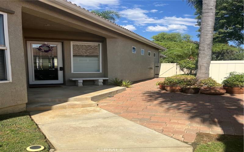 Walkway to entrance and side patio